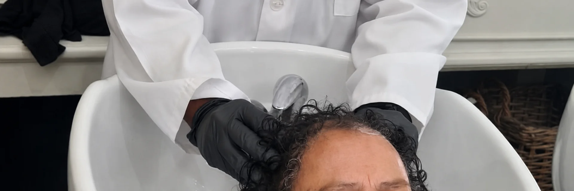 Scalp analysis procedure being performed in a clinical setting